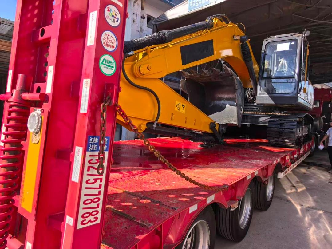 Excavator - On Lowbed Trailer - Loading